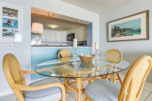 Enjoy a stylish living space with a dining area, kitchen, and comfortable seating.