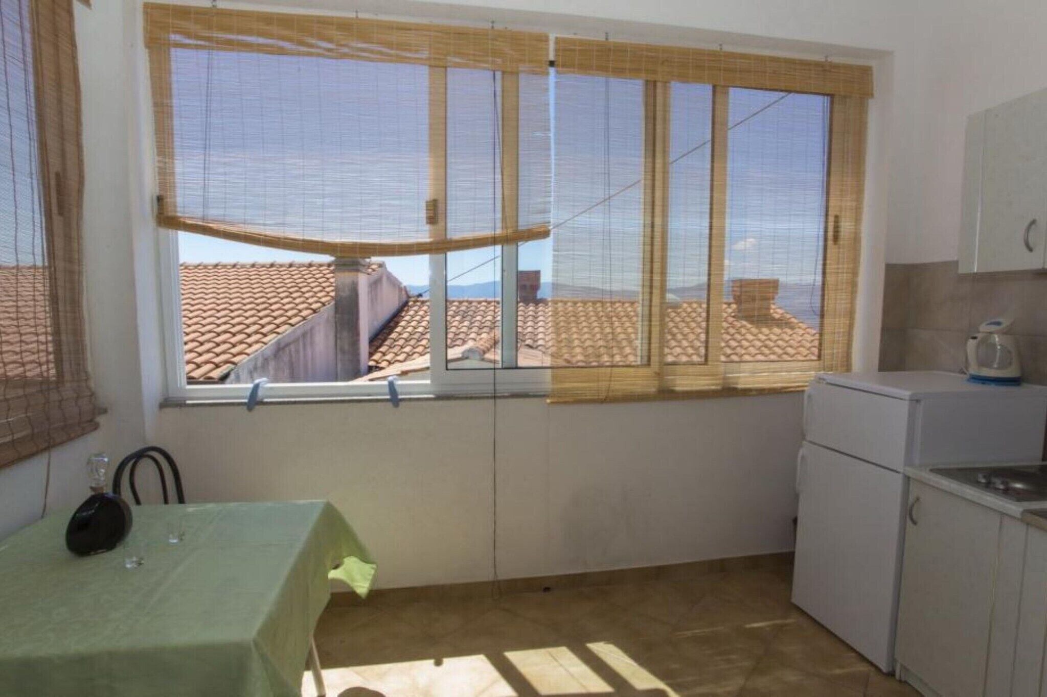 Fridge, stovetop, dining tables