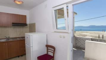 Fridge, stovetop, dining tables