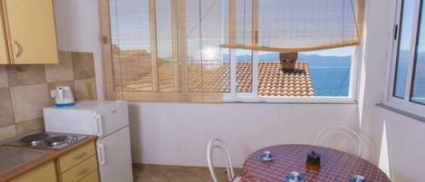 Fridge, stovetop, dining tables