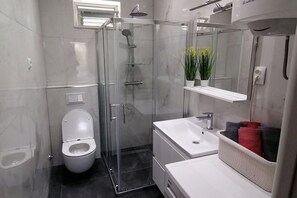 Ducha y secador de pelo