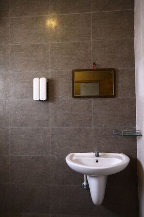 Deluxe Room | Bathroom | Shower, free toiletries, towels, soap - SP Residency  (Pollachi)