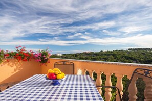 Outdoor dining - Standard Two Bedroom Apartment with Balcony and Pool (Krk)