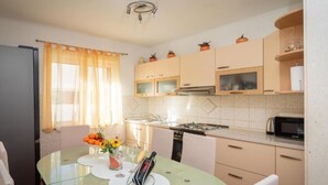 Private kitchen - Apartment Adriatic Pearl - One Bedroom Apartment with Balcony and Sea View (Omis)