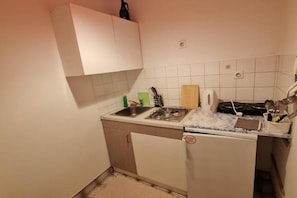 Fridge, stovetop, dining tables