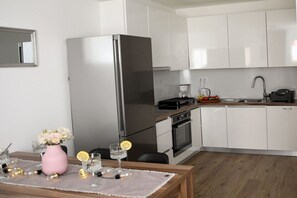 Oven, stovetop, dishwasher, coffee/tea maker