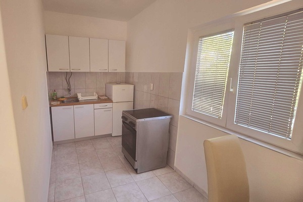 Fridge, stovetop, dining tables