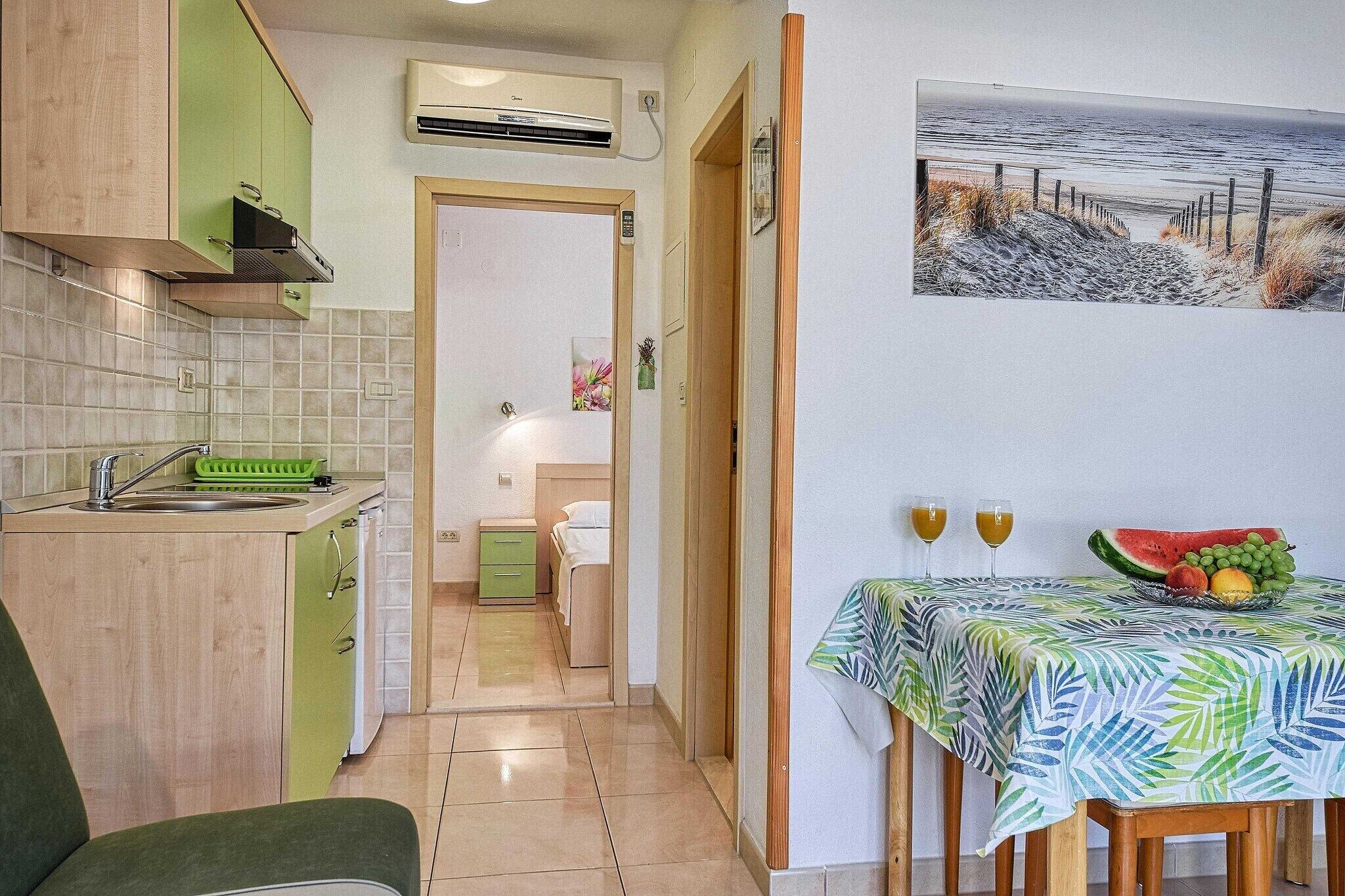 Fridge, stovetop, dining tables