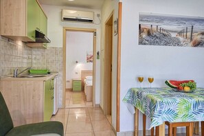 Fridge, stovetop, dining tables