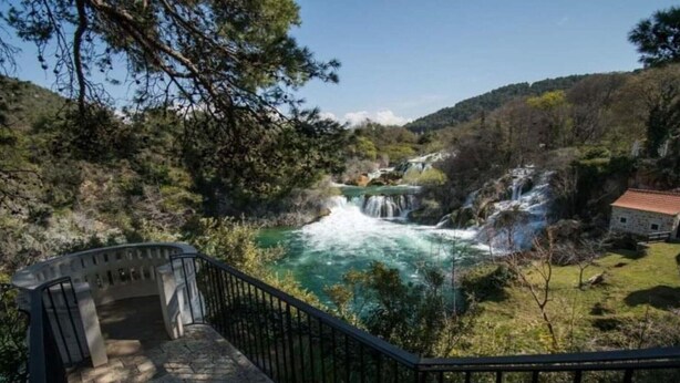 A stone staircase leading to a viewing platform overlooking a river with waterfalls. - Villa Nika - Three Bedroom Villa with Private Pool (Lozovac)