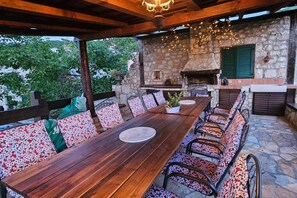 Outdoor dining - Authentic Dalmatian Hillside Escape with Pool, Sauna & BBQ - Seven Bedroom Holiday Home (Zadvarje)