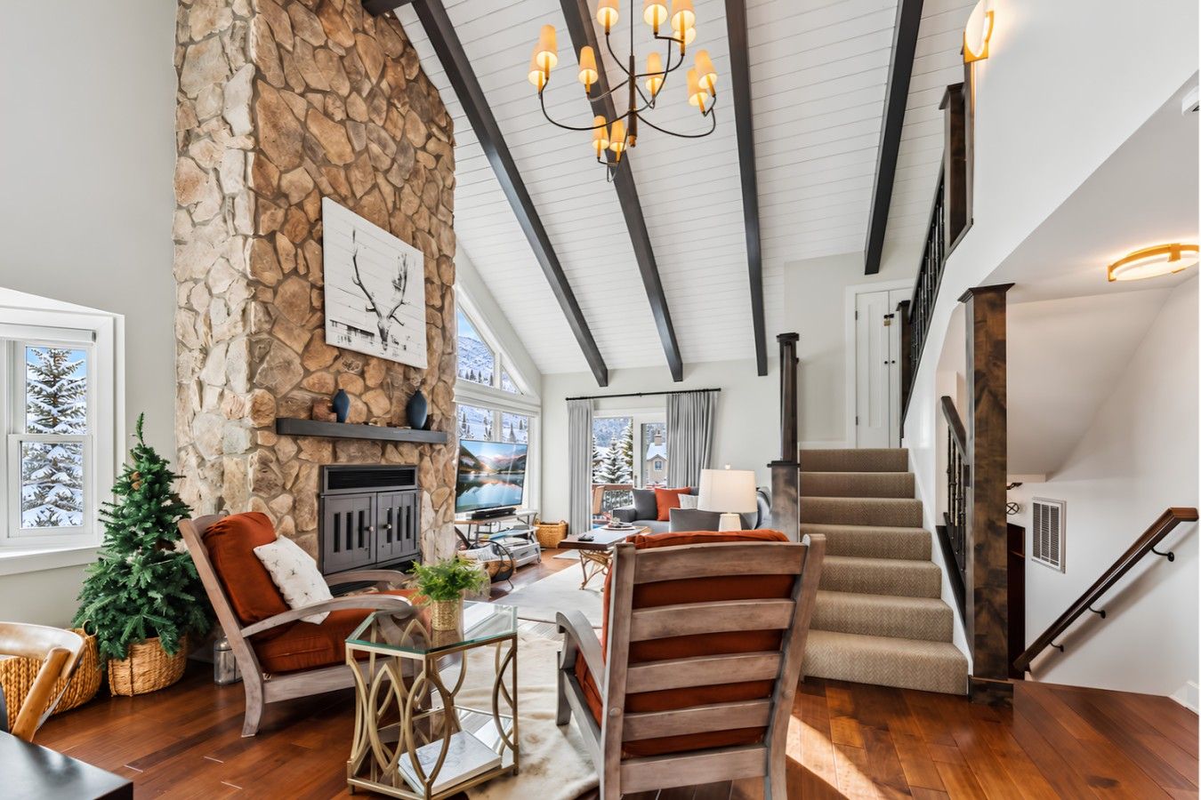Beautiful, open concept living with vaulted ceilings, natural light, and beautiful views