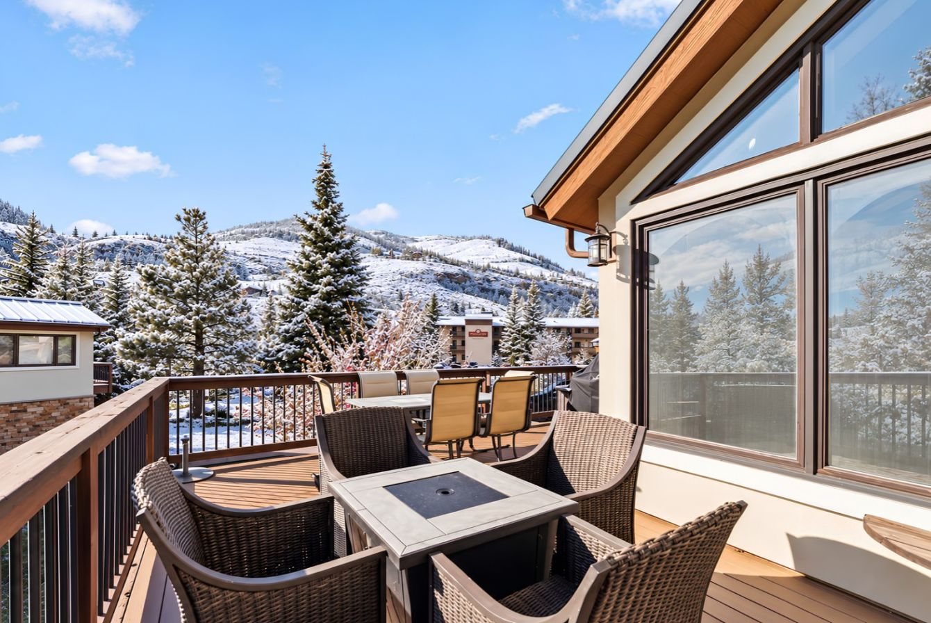 Wrap around deck with hot tub, fire pit, grill, and stunning views
