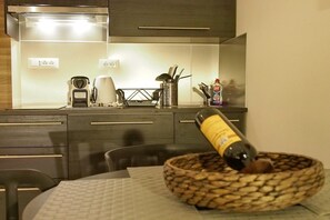 Fridge, stovetop, dining tables