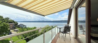 Cozy vacation home on the lake with stunning mountain and beach views