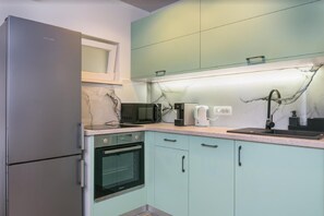 Fridge, microwave, oven, stovetop - Apartments Vujina - One Bedroom apartment and Balcony (Kastel Stafilic)
