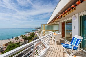 A balcony with a view of the beach and ocean. - LE CHANTILLY AP4464 by RIVIERA HOLIDAY HOMES (Cagnes-sur-Mer)