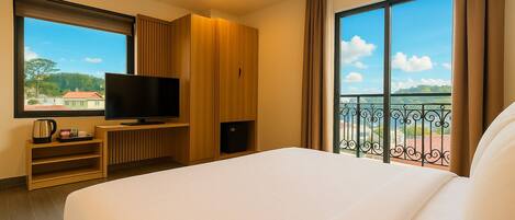 Deluxe Double with Balcony | Premium bedding, desk, soundproofing, free WiFi