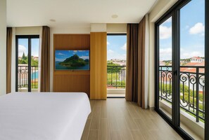 Deluxe Double with Balcony | Premium bedding, desk, soundproofing, free WiFi