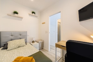 1 chambre, coffres-forts dans les chambres, fer et planche à repasser