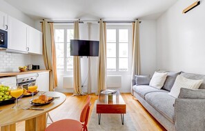 City Apartment, 1 Bedroom, Non Smoking | Living area | 40-inch Smart TV with satellite channels - Elegant 1BR by Eiffel - Sleeps 4 (Paris)