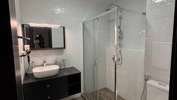 Hair dryer, bidet, towels, soap