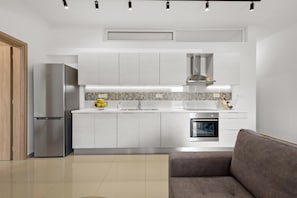Apartment, 2 Bedrooms | Private kitchen | Full-size fridge, oven, stovetop, espresso maker