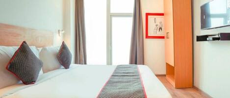 Suíte executiva | Wi-Fi de cortesia, roupa de cama