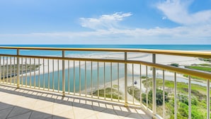 A balcony with a view of a beach and a clear sky. - Oceanfront Resort Condo w/ Pools in Myrtle Beach (Myrtle Beach)