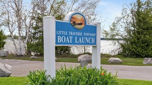 A sign for Little Traverse Township Boat Launch. - Crooked Lake Express (Alanson)