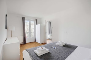 1 bedroom, laptop workspace, iron/ironing board, bed sheets
