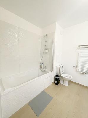 Shower, hair dryer, towels, soap