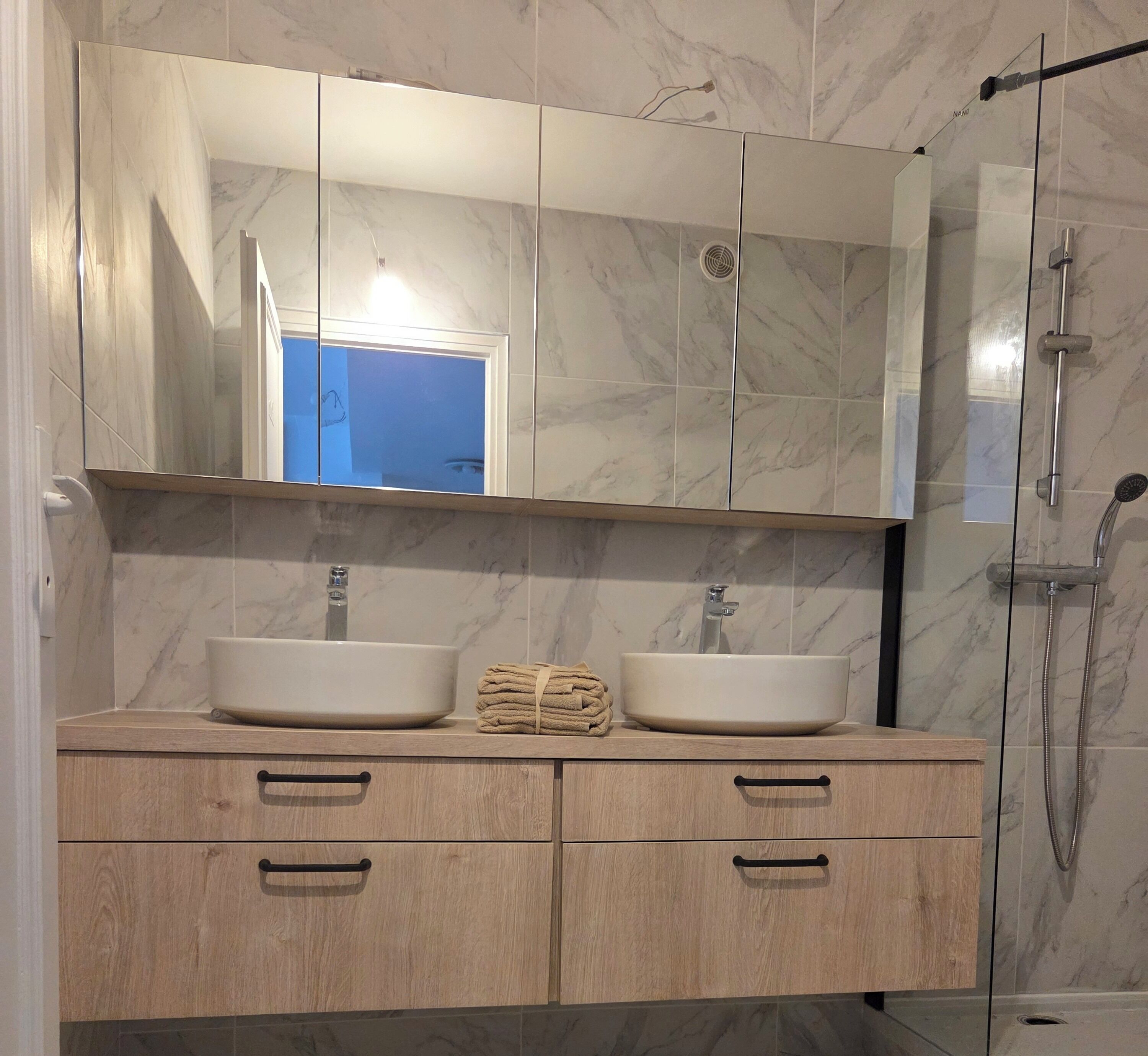 Shower, hair dryer, towels, soap