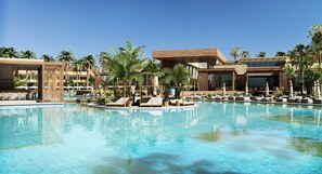 A resort pool with lounge chairs and palm trees. - JAZ Elite Riviera (Marsa Alam)