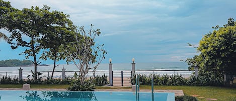 Outdoor pool, pool umbrellas, pool loungers