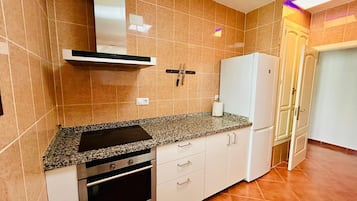 Microondas, horno y parrilla de estufa