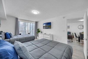 1 bedroom, desk, iron/ironing board, travel crib