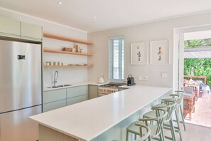 Coffee/tea maker, fridge, microwave, oven