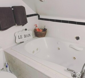 Jetted tub, hair dryer, towels, soap