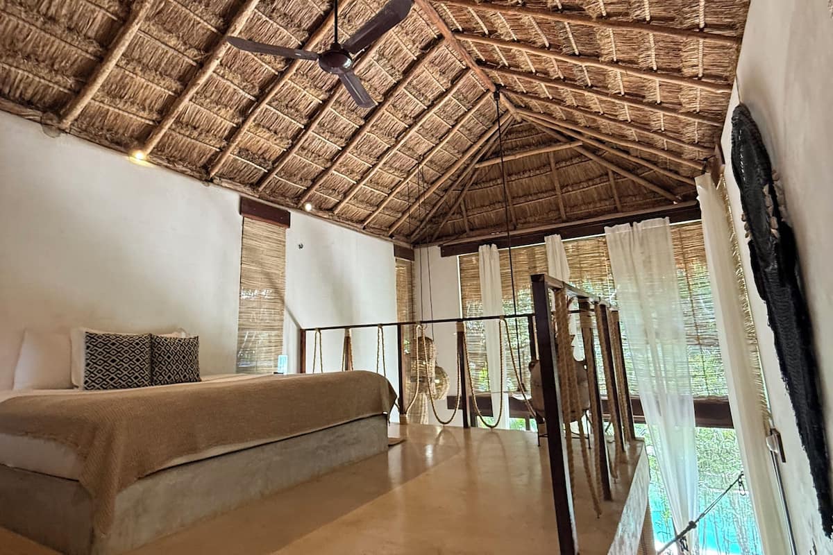 Luxury Bungalow, Pool View | In-room safe, individually decorated, individually furnished