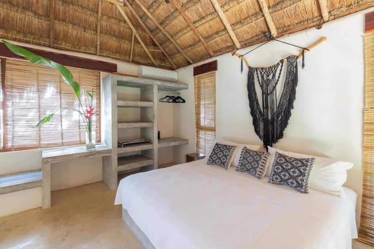 Luxury Bungalow, Pool View | In-room safe, individually decorated, individually furnished