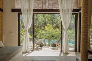 Luxury Bungalow, Pool View | In-room safe, individually decorated, individually furnished