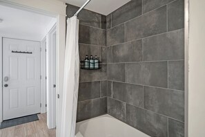 Hair dryer, towels, soap, shampoo