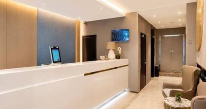 Yijia Hotel (Xinyi Railway Station Nanjing Road)