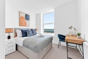 1 habitación, tabla de planchar con plancha, wifi gratis y ropa de cama 