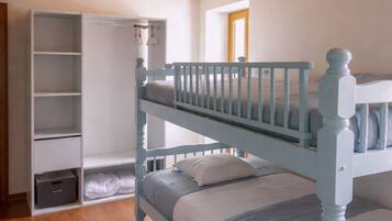 4 bedrooms, iron/ironing board, travel crib