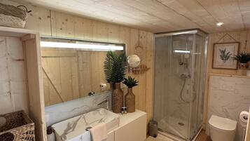 Shower, hair dryer, towels, soap