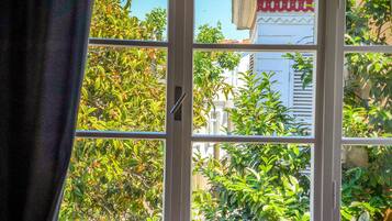 Deluxe Double Room, Sea View | Free minibar items, in-room safe, laptop workspace, blackout drapes