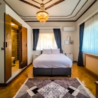 Deluxe Double Room, Courtyard View | Free minibar items, in-room safe, laptop workspace, blackout drapes