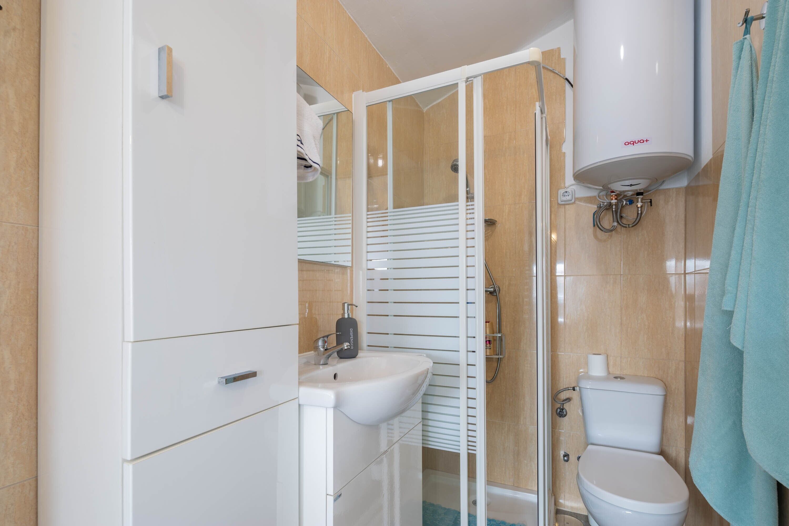 Douche, serviettes fournies